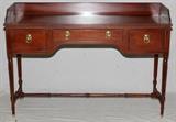 Lot#1156, BAKER FURNITURE CO. MAHOGANY SIDEBOARD, H 36", W 52", D 18"Bordered by a three-quarter gallery, fitted with three drawers, raised on turned supports joined by a stretcher.