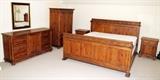 Lot#1158, DREXEL COUNTRY FRENCH STYLE BEDROOM SUITE, FIVE PIECES.Including a king size bed, two night stands H 28", L 23, D 17", a nine-drawer dresser H 35", L 67", D 20 and an entertainment center H 65", L 42", D 23".