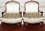 Lot#1174, FRENCH WALNUT FAUTEUILS, PAIR,Striped silk upholstery. Hand carved frames.