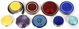 Lot#1246, ENAMELED SILVER COMPACTS, C. 1930S, NINE, DIA 1 1/4"-2 1/2"Nine guilloche enameled silver compacts, includes 2 English Birmingham sterling compact rouges, 1 .935 silver compact rouge, 1 French sterling powder blush compact, and 5 silver plated powder blush compacts, three of which have mirrored interiors; measuring DIA 1 1/4" to 2 1/2". Circa 1930s.
