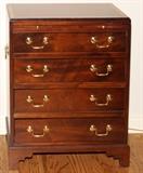 Lot#1281, CAMPAIGN STYLE MAHOGANY FOUR-DRAWER CHEST, H 31", W 25", D 13"Having an inlaid border on the top, writing slide and brass hardware.  Measures H.31 1/2" x 25" x 13 1/2".