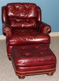 Lot#1273, HANCOCK & MOORE LEATHER LOUNGE CHAIR AND OTTOMAN.Tufted dark red leather with brass nail head trim.  Two items total.