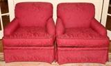 Lot#1498, UPHOLSTERED LOUNGE CHAIRS, PAIR.Upholstered in burgundy paisley fabric.  Measuring H.32" x 34".