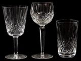 Lot#25, WATERFORD, 'LISMORE' CRYSTAL GLASSES, 33 PCS, H 5"-7"'Lismore' pattern crystal includes 12 water goblets at 7", 12 Rhine wines at 7 1/4", and 9 highball glasses at 5".