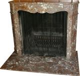 Lot#86, ROUGE MARBLE FIREPLACE, H 41.5", W 46", D 17"marble having brown tones, contoured edge across top of opening, the marble hearth comes with the marble mantle. Inner opening dimensions: H. 33", W. 32"
