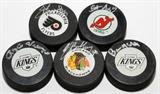 Lot#268, NHL AUTOGRAPHED HOCKEY PUCKS, 5 PCS.includes pucks signed by Ed Balfour, Chicago Black Hawks, Scott Niedermeyer, New Jersey Devils, Eric Lindros Philadelphia Flyers, Rogie Vachon and Bruce McNall (owner) Los Angeles Kings.
