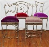 Lot#315, WROUGHT IRON BAR STOOLS, FOUR, H 46.5", L 18", D 17.5"Illegibly signed on the underside.  Each gold tone bar stool has a crushed velvet cushioned seat.