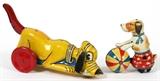Lot#364, TIN 'DOG' TOYS, TWO Marx Walt Disney, C. 1939, Pluto figure, # 2011 and # 625, L 9 1/2". Other dog with ball # 4697, H 4 1/2".