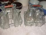 old milk crates with milk jars