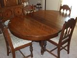 antique tiger oak dining table with 2 leaves