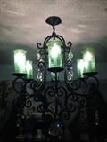 Gorgeous large wrought iron chandelier with green crackalure diffusers $300