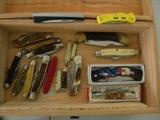 Small collection of pocket knives.