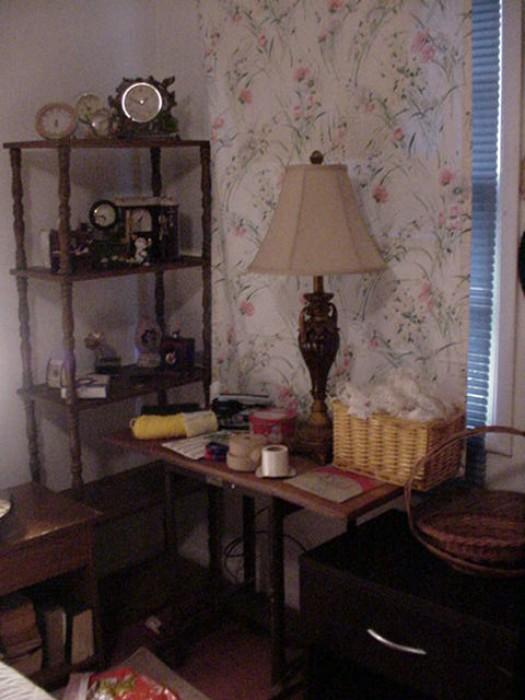 Book Shelf, side tables, basket of sewing items, lamp, clocks