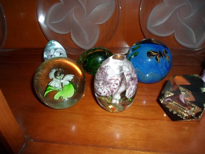 a collection of paper weights