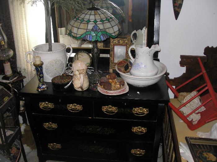Antique dresser & leaded lamp.