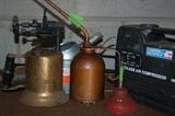 Oil Cans and Torch