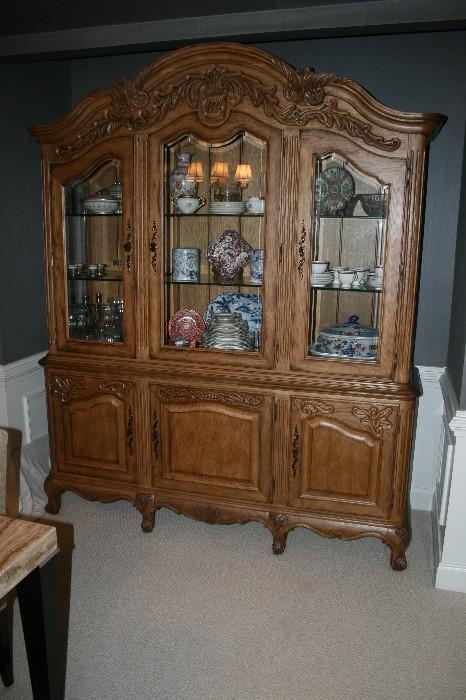 Ornate carved china cabinet