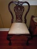 One of 8 high quality solid mahogany Chippendale chairs (about 20 years old)