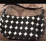 Initials, Inc. Sassy Bag - Hobo style - Oasis pattern Approx. 15 inches wide at largest point and 8 inches deep/zippered closure/small zippered pocket inside of bag 8 inches wide.
Size:Approx. 8" x 15"
Donor: Ruth Ann Neiman
Shipping: Yes, paid for by donor 