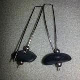 Pair of sterling silver dangle earrings with beach stones. Stones were found on Cape Cod beaches and I drilled holes in them and made earrings, one of a kind and very symmetrical! Quite lovely and an interesting design.
Donor: Joanne Cassulo
Shipping: Yes, paid for by donor 