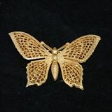 A peyote stitch bracelet in a diamond shape design. Black background with diamonds in teal and rose colors edged in gold. Clasp is 14 karat gold filled. Bracelet length is 7.5 inches end to end, including clasp.
Size: 7 1/2"
Donor: Joanne Cassulo
Shipping: Yes, paid for by donor 