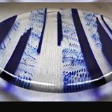 Handcrafted fused glass plate, royal blue and clear glass. 10" diameter, 3/8" thick. Gradual curve to 3/4" high at edge. Food safe. Shipping within USA included. Valued at $110. Donated by Tracey Petryshen - Blue Heron Studio.
Size: 10"
Donor: Tracey Petryshen
Shipping: Yes, paid for by donor 