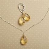 By Izuly Jewelry. Beautiful golden yellow citrine necklace and earring set. The jewelry is designed to connect with the 3rd or solar plexus chakra. The color connected to this chakra is yellow and citrine is one of a few stones that works with it. The stones dangle from sterling silver lever back ear wire.
Donor: Nancy
Shipping: Yes, paid for by donor 