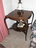 Elegant two tier scalloped end table                     with stately  brass  & Lenox lamp