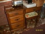 desk and needlepoint stool