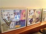 selection of framed Krewe of Endymion Mardi Gras memorabilia