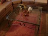 Glass-top coffee table from Expressions Furniture