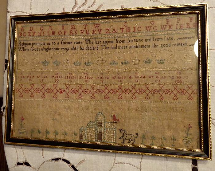 One of over 20 antique samplers