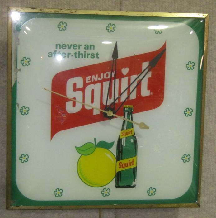 Squirt PAM Advertising Clock