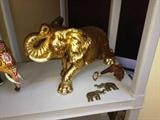 Large gold tone elephant is a bobble head!