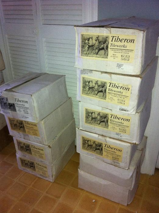 Several boxes of assorted luxury ceramic tiles.