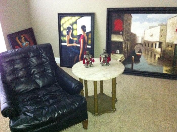 Vintage vinyl chair, side table and décor; contemporary original paintings.