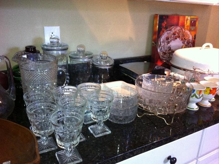 Assorted vintage glassware and kitchenware.