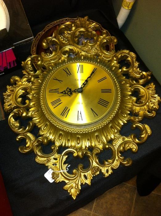 Vintage gold-tone decorative clock.