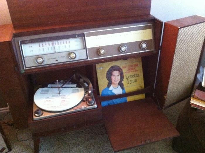 Retro stereo with fold-out speakers and fold-down turntable.