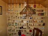 Over 100 vintage jars including Macon and Ball.