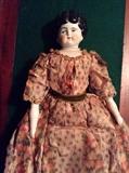 One of several antique china dolls