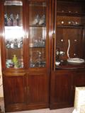 both sections of entertainment center are filled with crystal