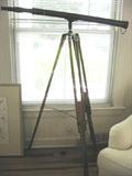 Antique telescope on stand