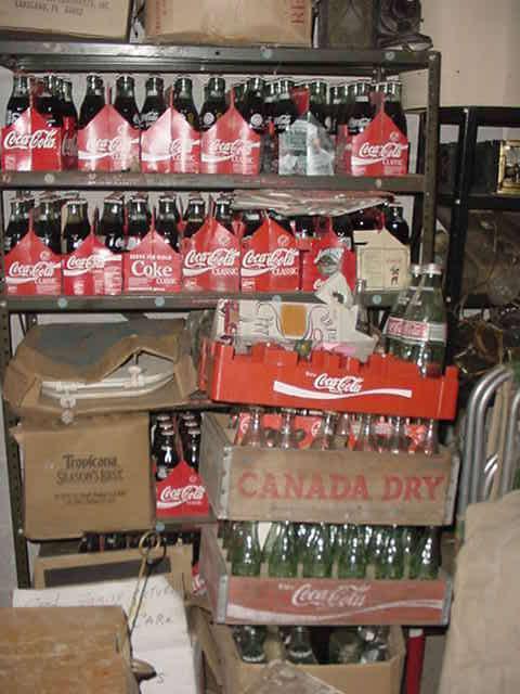 100's and 100's of Coke bottles and cases of every vintage, as well as MANY of other bottlers too 
