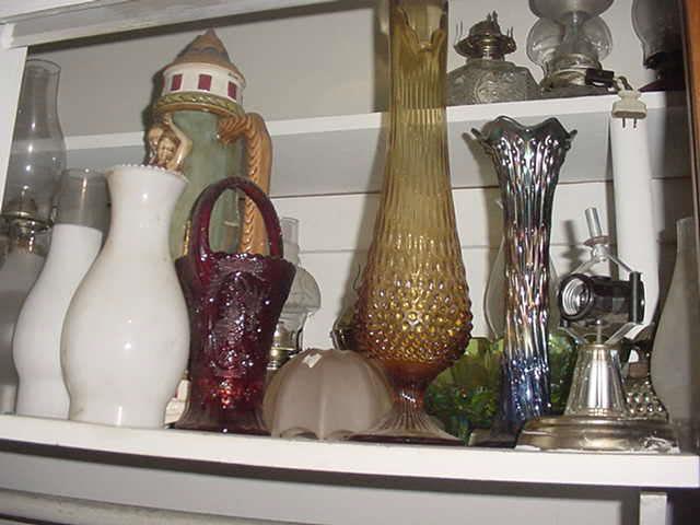 More of the glassware, carnival glass, steins, oil and other lamps
