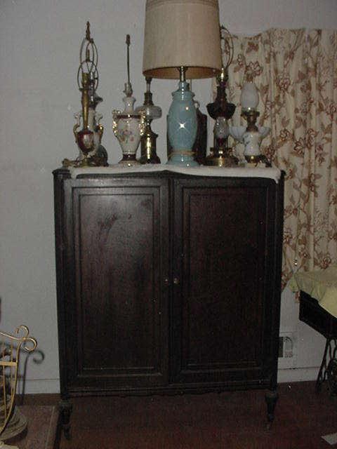 Nice antique armoire with some of the lamps