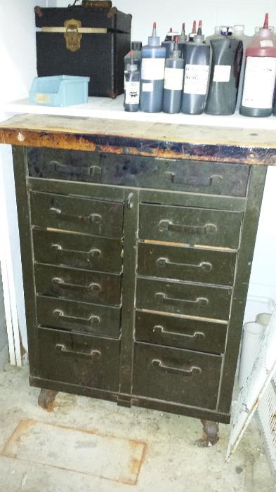 Industrial style cabinet with many drawers