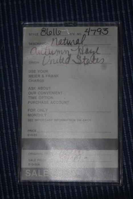original purchase tag for fur coat