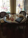 marbletop dinette set with four chairs