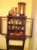 small curio full of vintage dolls AND MANY MORE STUFFED ANIMALS